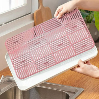 Egouttoir avec surface intérieure striée 