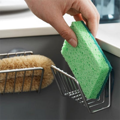 Porte éponge contenant éponge verte